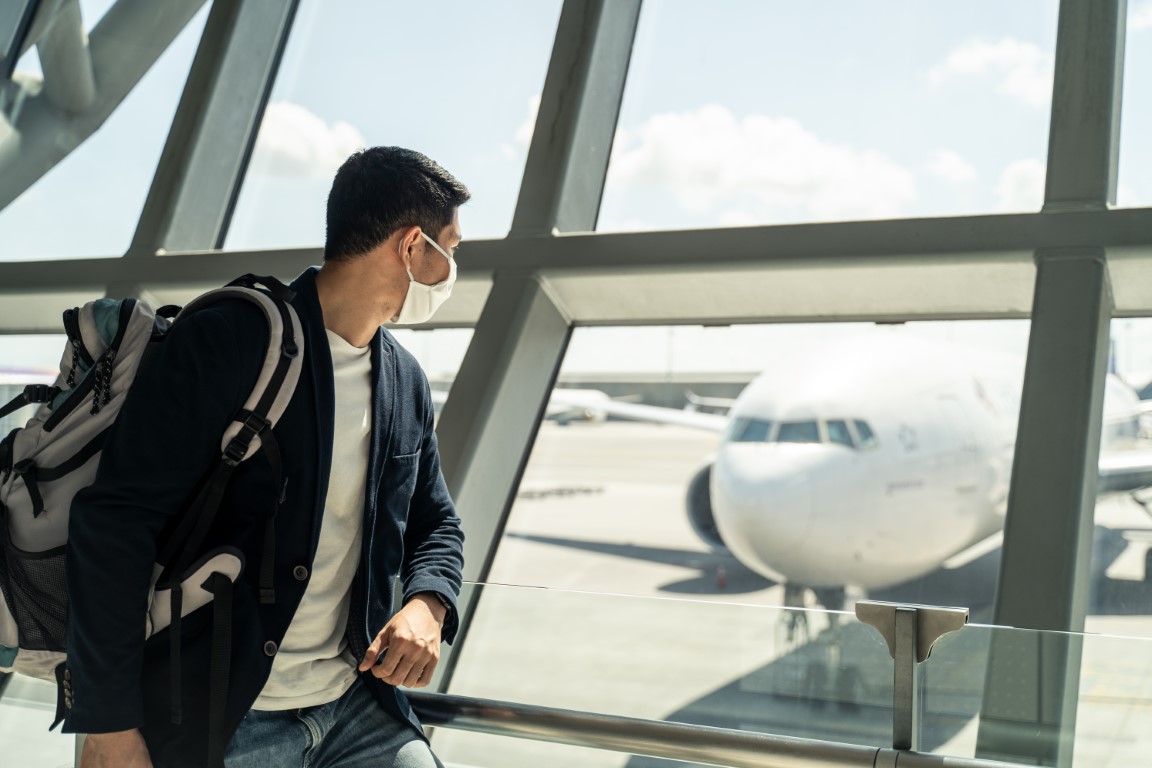 asian traveler business man wait to board into air 2022 01 19 00 17 15 utc