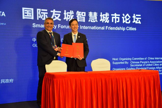 &Tau;&zeta;&iota;&omicron;ύ&mu;&eta;&sigmaf;: &laquo;&Alpha;&nu;&alpha;&pi;&tau;ύ&sigma;&sigma;&omicron;&upsilon;&mu;&epsilon; &sigma;&chi;έ&sigma;&epsilon;&iota;&sigmaf; &sigma;&upsilon;&nu;&epsilon;&rho;&gamma;&alpha;&sigma;ί&alpha;&sigmaf; &sigma;&epsilon; &epsilon;&mu;&pi;&omicron;&rho;&iota;&kappa;ό, &tau;&omicron;&upsilon;&rho;&iota;&sigma;&tau;&iota;&kappa;ό &kappa;&alpha;&iota; &pi;&omicron;&lambda;&iota;&tau;&iota;&sigma;&tau;&iota;&kappa;ό &epsilon;&pi;ί&pi;&epsilon;&delta;&omicron; &mu;&epsilon; &tau;&eta;&nu; &pi;ό&lambda;&eta; Guiyang &tau;&eta;&sigmaf; &Kappa;ί&nu;&alpha;&sigmaf;&raquo;