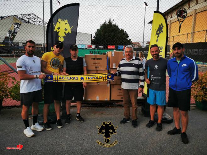 &Pi;&alpha;&rho;ά&delta;&omicron;&sigma;&eta; 6000 &mu;&alpha;&sigma;&kappa;ώ&nu; &sigma;&tau;&omicron;&upsilon;&sigmaf; &pi;&lambda;&eta;&gamma;έ&nu;&tau;&epsilon;&sigmaf; &tau;&eta;&sigmaf; &Theta;&epsilon;&sigma;&sigma;&alpha;&lambda;ί&alpha;&sigmaf; &alpha;&pi;ό &tau;&omicron;&nu; ό&mu;&iota;&lambda;&omicron; &tau;έ&nu;&iota;&sigmaf; &tau;&eta;&sigmaf; &Alpha;&Epsilon;&Kappa; &Tau;&rho;ί&pi;&omicron;&lambda;&eta;&sigmaf; &mu;έ&sigma;&omega; &tau;&omega;&nu; Tigers Club '06