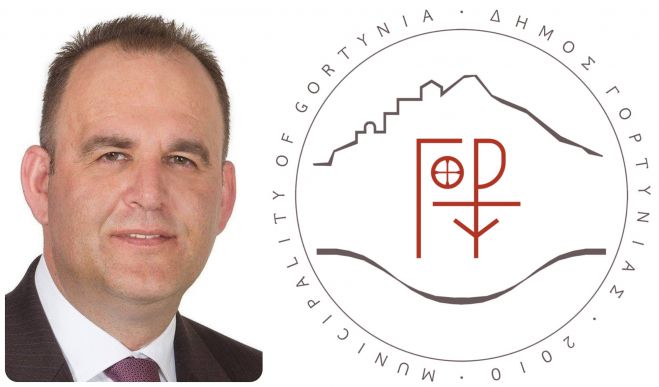 &Omicron; &Delta;ή&mu;&alpha;&rho;&chi;&omicron;&sigmaf; &Gamma;&omicron;&rho;&tau;&upsilon;&nu;ί&alpha;&sigmaf; &gamma;&iota;&alpha; &tau;&alpha; &alpha;&pi;&omicron;&tau;&epsilon;&lambda;έ&sigma;&mu;&alpha;&tau;&alpha; &tau;&omega;&nu; &Pi;&alpha;&nu;&epsilon;&lambda;&lambda;&alpha;&delta;&iota;&kappa;ώ&nu; &epsilon;&xi;&epsilon;&tau;ά&sigma;&epsilon;&omega;&nu;