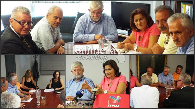 &Sigma;&tau;&eta;&nu; &Tau;&rho;ί&pi;&omicron;&lambda;&eta; &eta; &Phi;&omega;&tau;ί&omicron;&upsilon; &tau;&omicron;&upsilon; &Sigma;&Upsilon;&Rho;&Iota;&Zeta;&Alpha;- &Eta; &epsilon;&pi;ί&sigma;&kappa;&epsilon;&psi;&eta; &sigma;&tau;&omicron; &Delta;&eta;&mu;&alpha;&rho;&chi;&epsilon;ί&omicron; &kappa;&alpha;&iota; &tau;&omicron; &mu;ή&nu;&upsilon;&mu;&alpha; &gamma;&iota;&alpha; &tau;&eta; &phi;&tau;ώ&chi;&epsilon;&iota;&alpha; (vd)